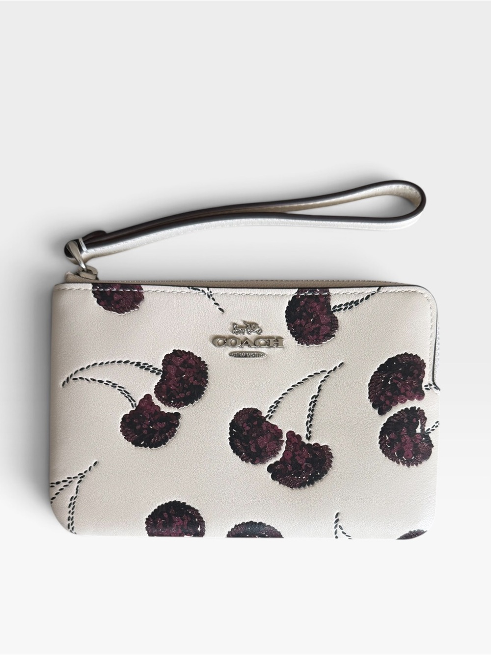Coach Cream Leather Wristlet with Burgundy Cherry Motif